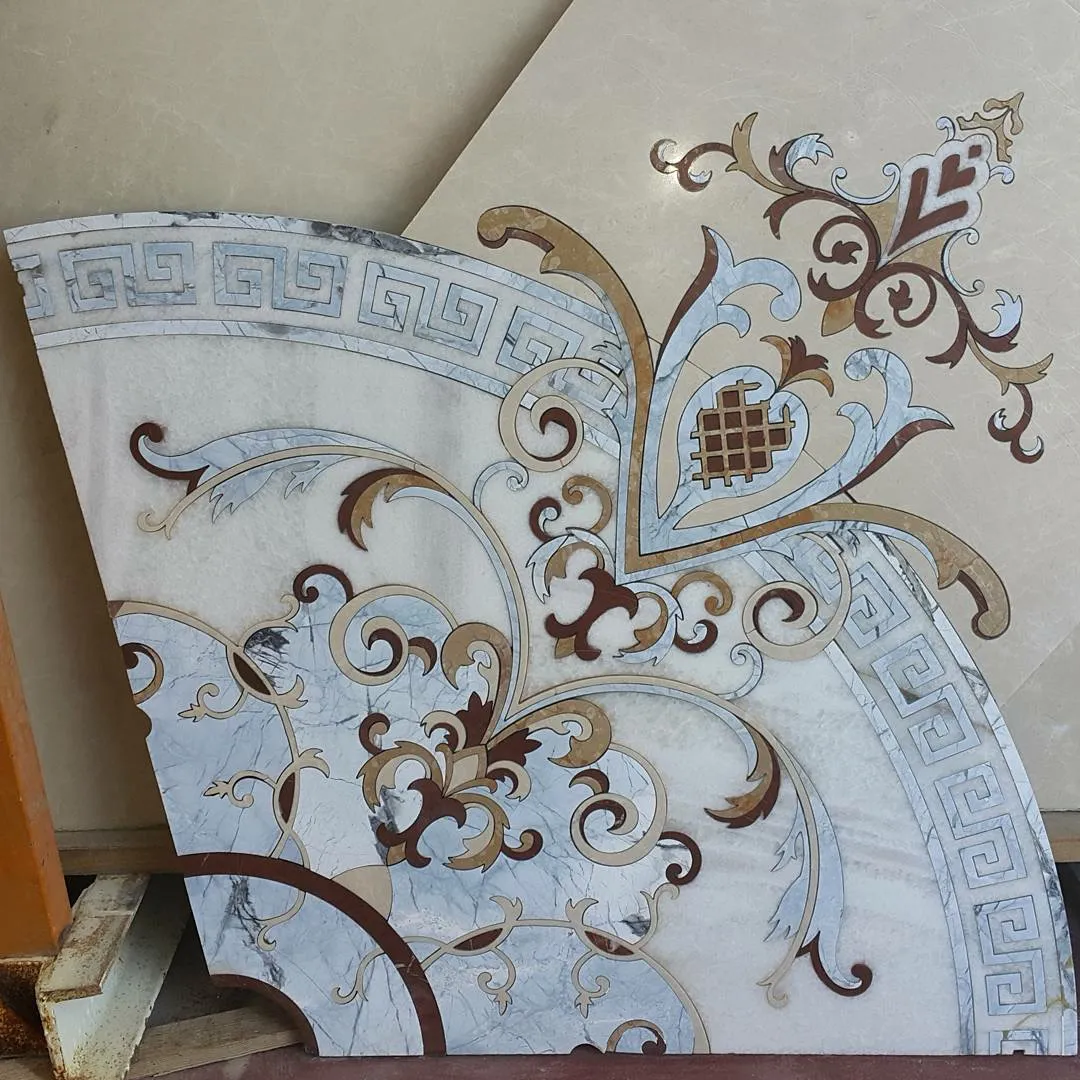 Waterjet teknolojisi ile üretilmiş dekoratif mermer motif ve özel desen uygulaması.